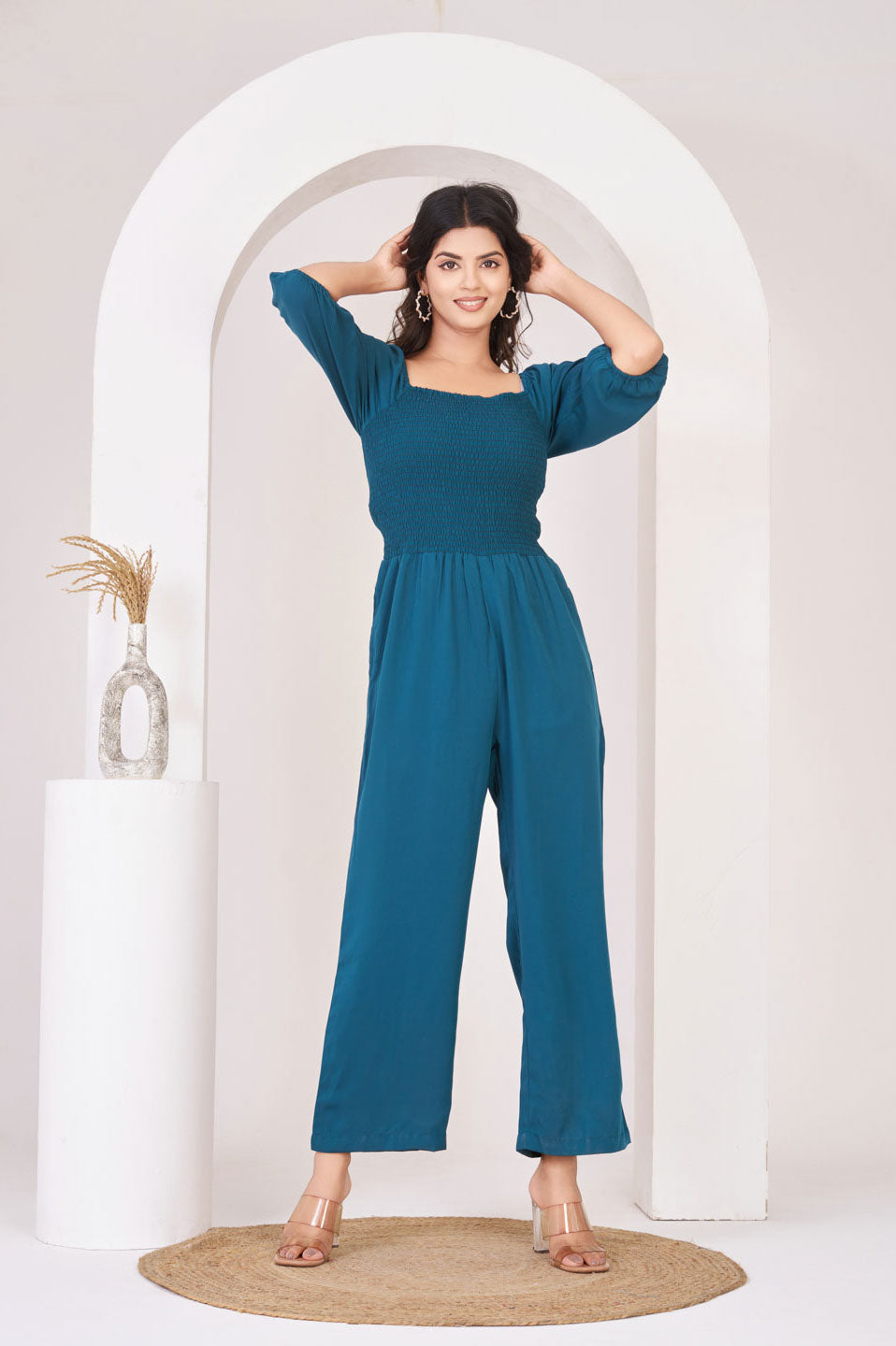 Teal Smocked georgette jumpsuit